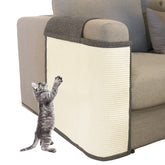 Oroonoko cat scratch sofa protector on dark grey couch, guards furniture from claws.