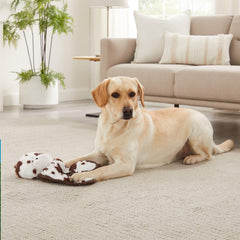 Outward Hound Cuddle Tugs cow plush body squeaker enhances tug-of-war fun.