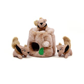 Outward Hound Hide-A-Squirrel puzzle toy on floor for interactive play and problem-solving.