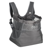 Outward Hound PupPak front carrier worn by a person, secure for small dogs.