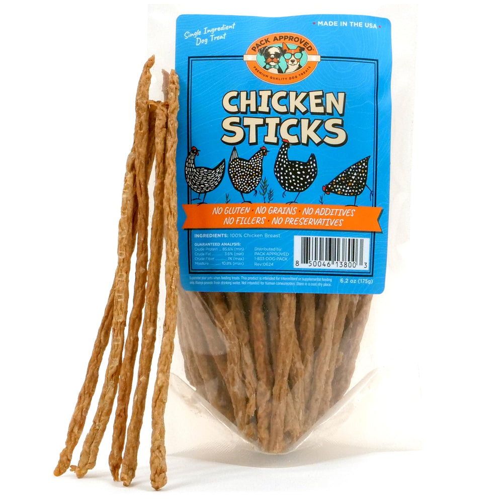 Pack Approved chicken sticks dog treats in hand for training rewards.