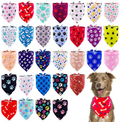 Pai Sence paw print bandana worn on a large dog for a cute, stylish look.