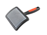 RYAN'S PAW BROTHERS curved head slicker brush used on large dogs for full-coverage grooming.