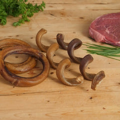 Pawstruck Bully Stick Springs closeup of meat juices highlighting natural flavor
