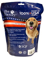 Dog enjoying Pet Factory beefhide braid stick during chew time