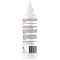 Truseb ear cleaner being applied to a dog's outer ear for cleansing.