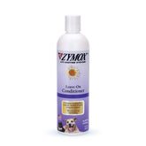 Pet King Brands ZYMOX leave-in conditioner bottle demonstrates detangling and conditioning.
