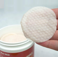 Pet MD topical wipes used between folds and skin for clean grooming.