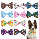 PET SHOW paw pattern bow tie in pink adds cute flair for photos and parties.