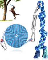 Petbobi Bungee Dog Toy hanging from a sturdy tree for solo outdoor tug play.