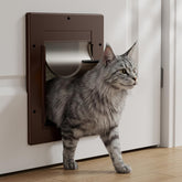 PETCOMING cat door with soft magnetic flap in action, gentle close for paws and drafts