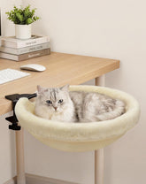 Petcozife Cat Desk Bed on a desk with rotating round perch for flexible viewing angles