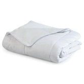 PetFusion Premium cooling blanket on the floor provides breathable relief for hot days.