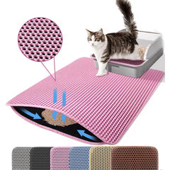 Petinstinct extra-large cat litter mat in front of the box catching stray litter.