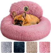 PetJett Calming Donut Bed 23-inch pink with plush fur for cozy naps.