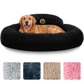 PetJett 36-inch donut bed in black offers calming comfort.