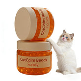 petlifebio Cat Calm Beads two-pack resting near a cat bed for a soothing ambiance