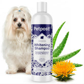 Petpost dog whitening shampoo bottle highlights coconut oil and aloe for brighter coats.