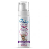 Pet's Fav waterless cat shampoo bottle in use for on-the-go foam cleaning.