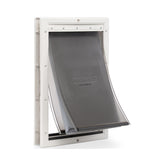 PetSafe Extreme Weather dog door installed in exterior door frame for easy pet access.