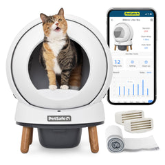 Petsafe ScoopFree SmartSpin box front view shows a modern self-cleaning system.