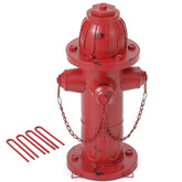 Phaxth 16-inch metal dog hydrant in yard for designated pee spot.