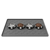 Pieviev dog-cat bowl mat with raised edge prevents spills.