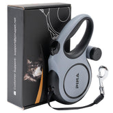 Pina Upgraded Retractable Leash extended in a field for secure exploration