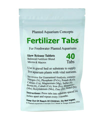 Close-up of tabs pressed into gravel bed delivering nutrients to aquatic plants