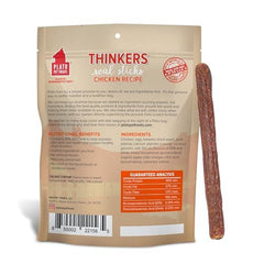 PLATO Thinkers dog enjoying air-dried chicken stick treat
