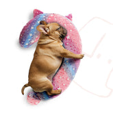POMESEA calming dog pillow glows in the dark with pink question-mark shape.
