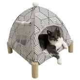 Pozico cat bed tent with wooden frame for cozy indoor use.