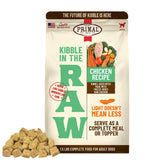 Primal Kibble in The Raw bag close-up highlighting freeze-dried chicken protein for active dogs.
