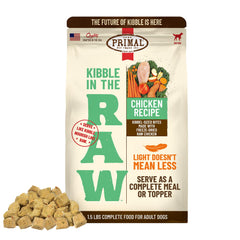 Primal Kibble in The Raw bag close-up highlighting freeze-dried chicken protein for active dogs.