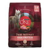 Purina ONE True Instinct high-protein dog food bag shows real beef and salmon for muscle support