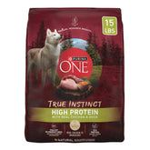 Purina ONE True Instinct dry dog food bowl close-up showing high-protein kibble for active dogs.