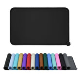 Reopet waterproof feeding mat with high raised edges keeps spills contained.