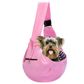 Riuja Adjustable Dog Carrier Sling pink worn on shoulder for hands-free strolls