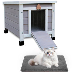 Rockever outdoor cat house with soft mat showing a cozy wooden shelter for outdoor cats and small pets