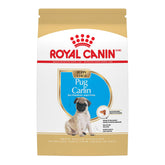 Royal Canin Pug Puppy Dry Food bag highlighting breed-specific formula for small pugs.