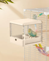 Septillar bird-feeder-bath-cage provides combined bathing and feeding for small birds.