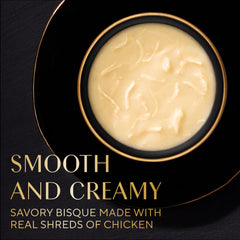 Close-up of Sheba Bisque Lickable chicken shreds in bisque for taste