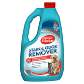 Simple Solution Stain & Odor Eliminator bottle on carpet for pet mess cleanup