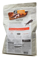 SIMPLY NOURISH puppy kibble close-up emphasizes real salmon protein and texture.