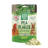 Small Pet Select pea flakes in a bowl, wholesome all-natural treat for small pets.