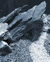 Close-up of silvery mica luster on deep grey slate for tanks.
