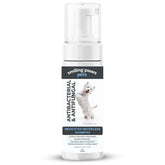 Smiling Paws Pets Medicated Waterless Shampoo bottle provides quick, water-free cleansing for busy owners.