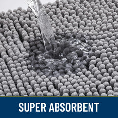 Smiry door mat with low-profile design fits under doors while trapping dirt.