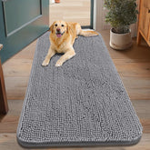 Smiry dog door mat showing muddy paws; absorbent surface helps keep floors clean.
