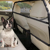 Snagle Paw dog car barrier provides full back seat coverage for safe trips.